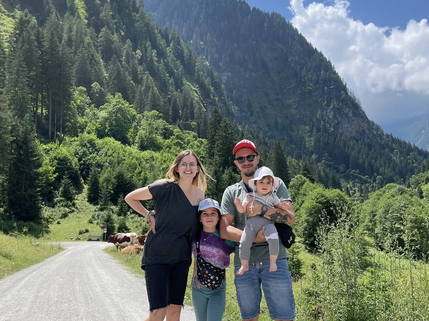 Family photo in front of mountains