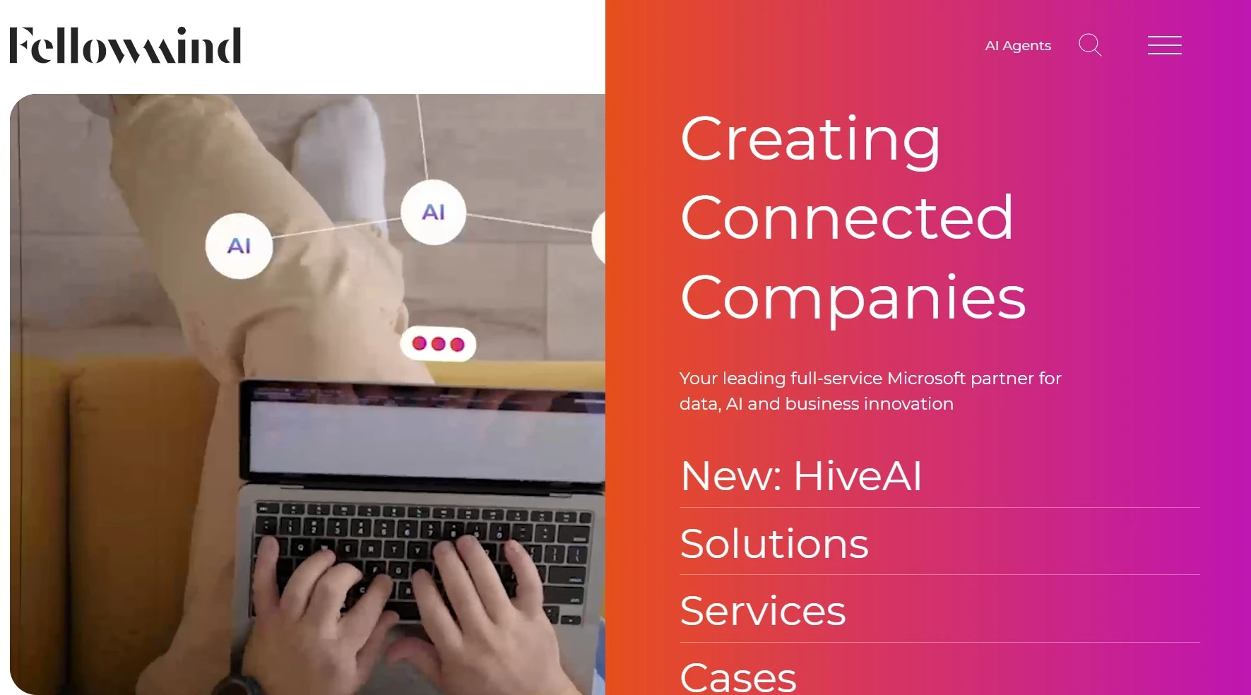 A Fellowmind website titled Creating Connected Companies and a picture of hands typing on a laptop.