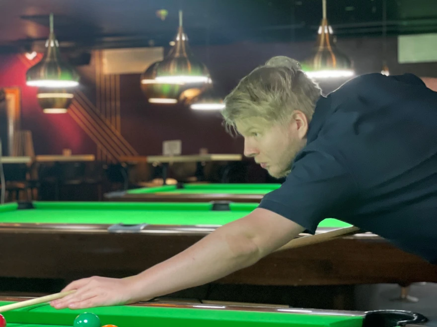 Emil playing pool
