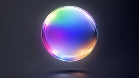 Shiny, translucent sphere displaying a gradient of vibrant rainbow colors on a dark background.