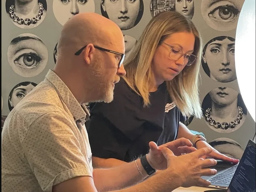 Man and woman at computer