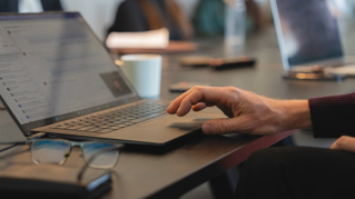 Hand on a keyboard for laptop