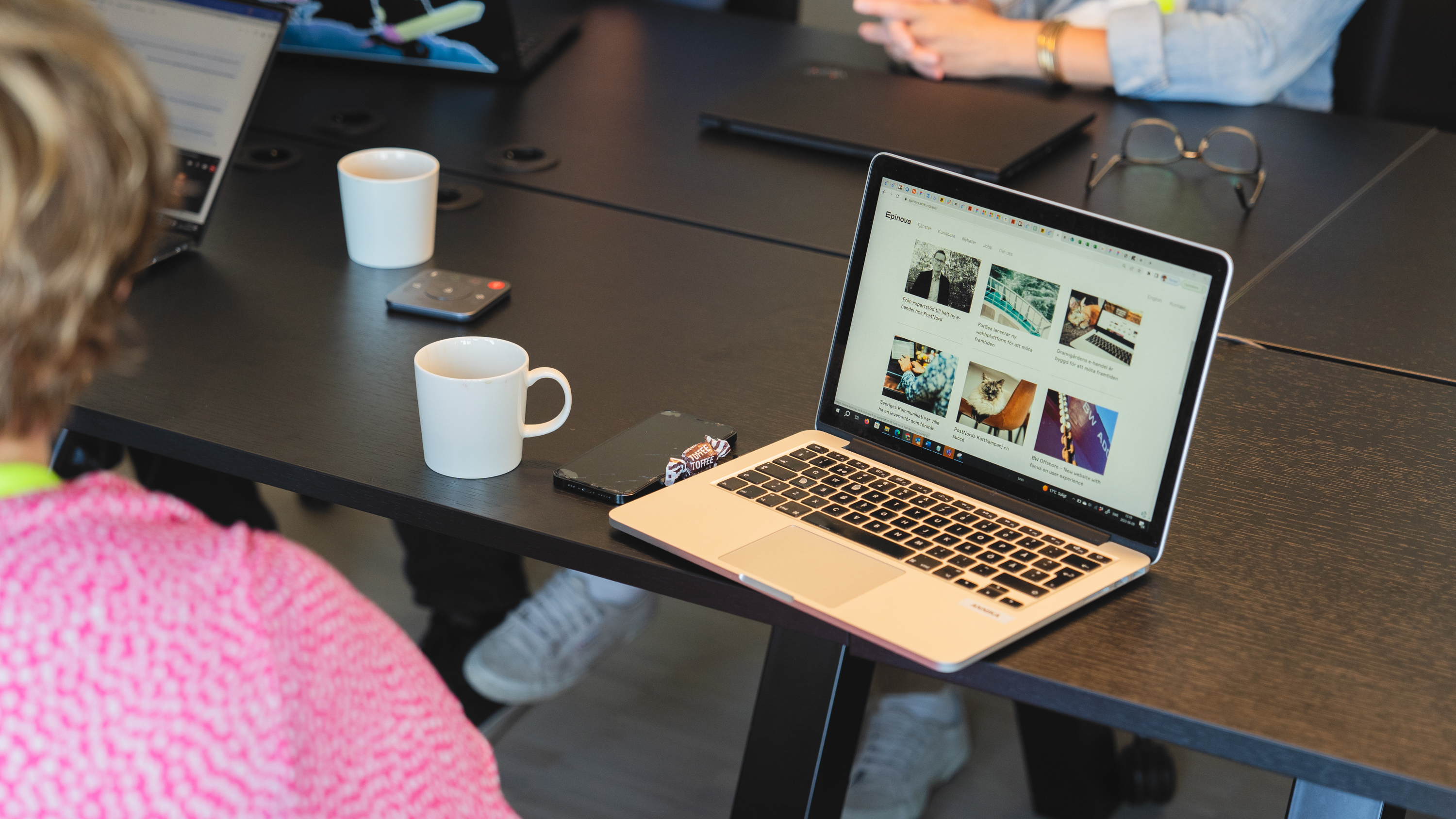 conference room with a laptop screen in focus