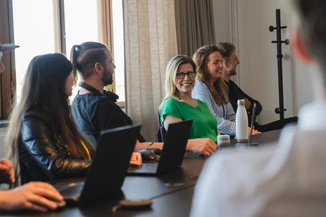 Happy people in a meeting room
