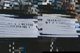 A sign saying What are you waiting for