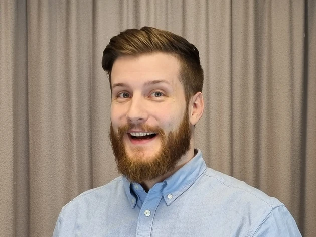 very happy bearded man